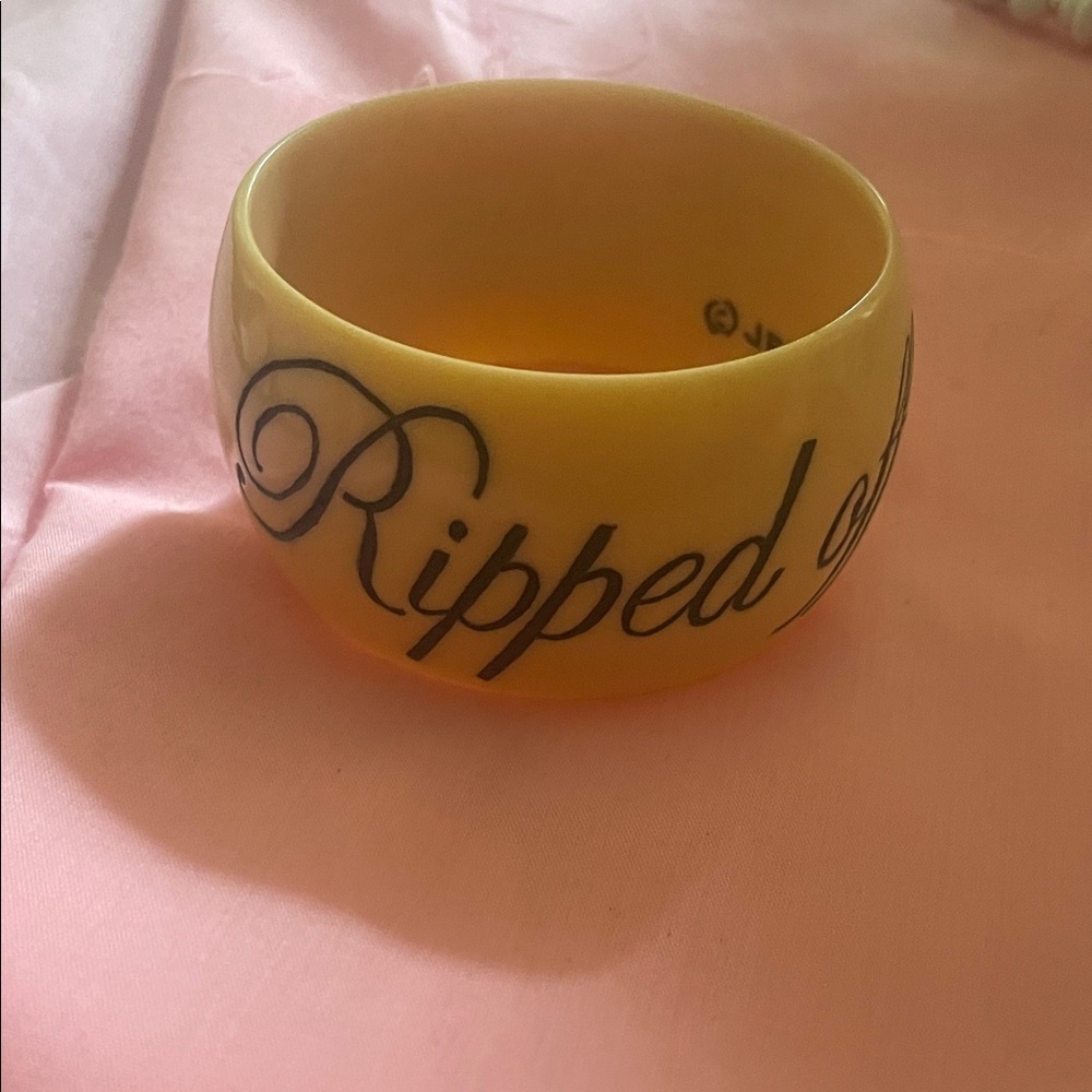 Jessica Kagan Cushman Ripped off by CHANEL Script Bangle Bracelet
